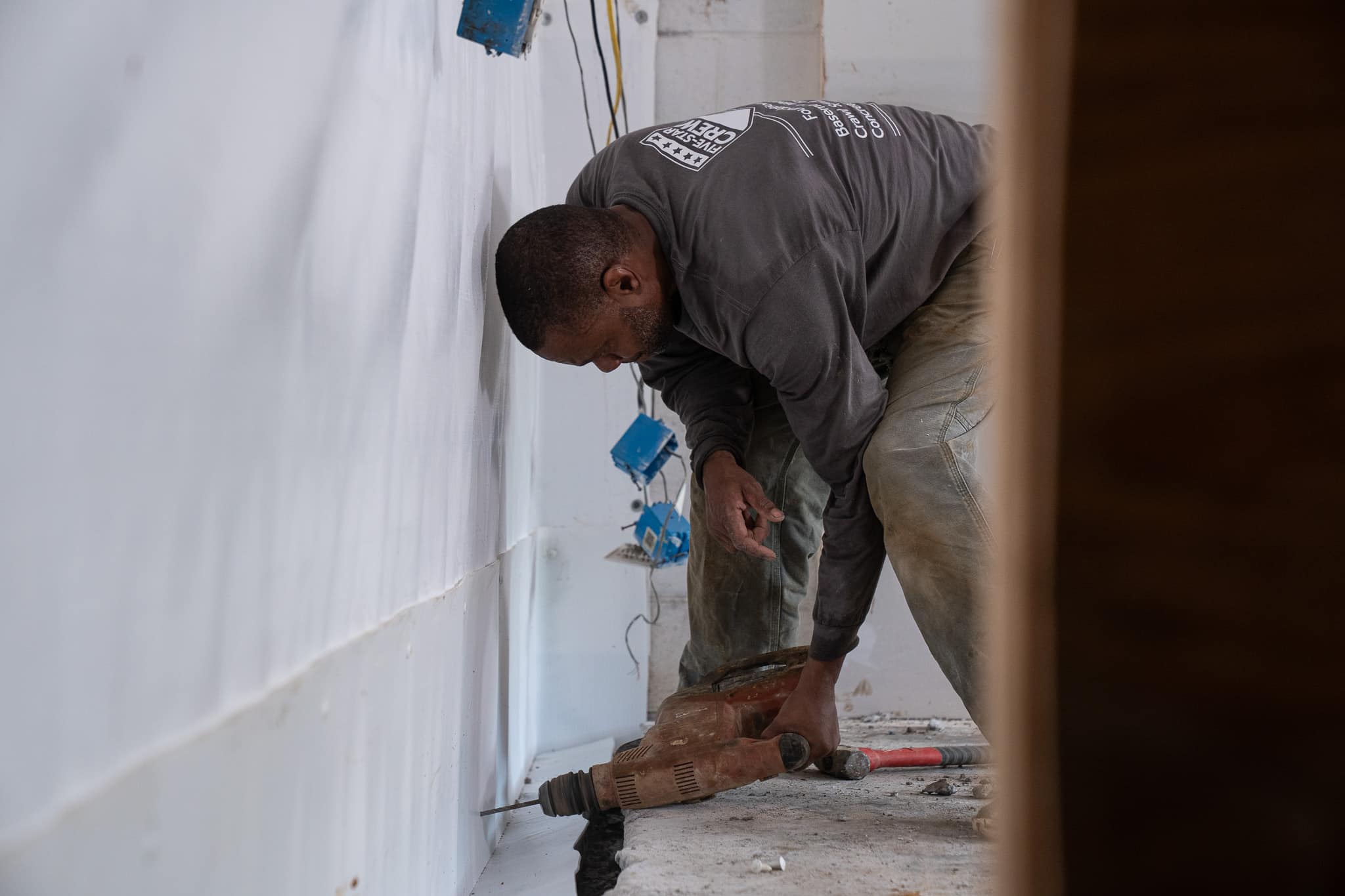 Installing an interior drain.